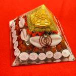 Golden Lakshmi Money Magnet Pyramid with Rudraksha, Shree Yantra, Gomti Chakra & White Kaudi